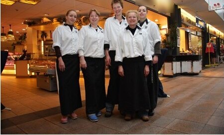 Het team voor de winkel
